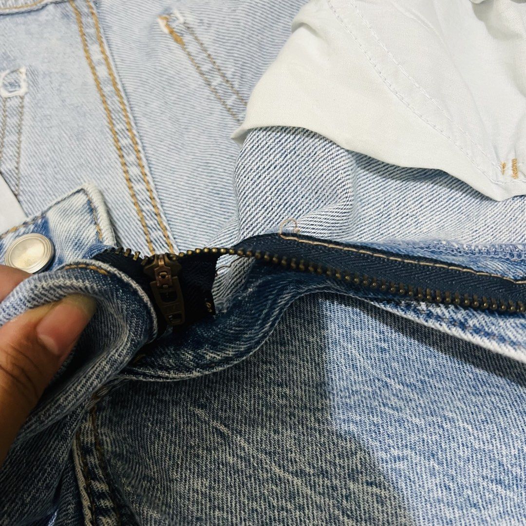 ZARA Light Wash Denim Jeans (Category: Jeans) located in Marikina City. Submitted by kzells13 (Listing ID 1461579878, Image 2). Description: - ZARA light wash denim jeans - Classic straight leg fit - Zipper fly with button closure - Two front and two back pockets - Versatile for casual, everyday outfits.
