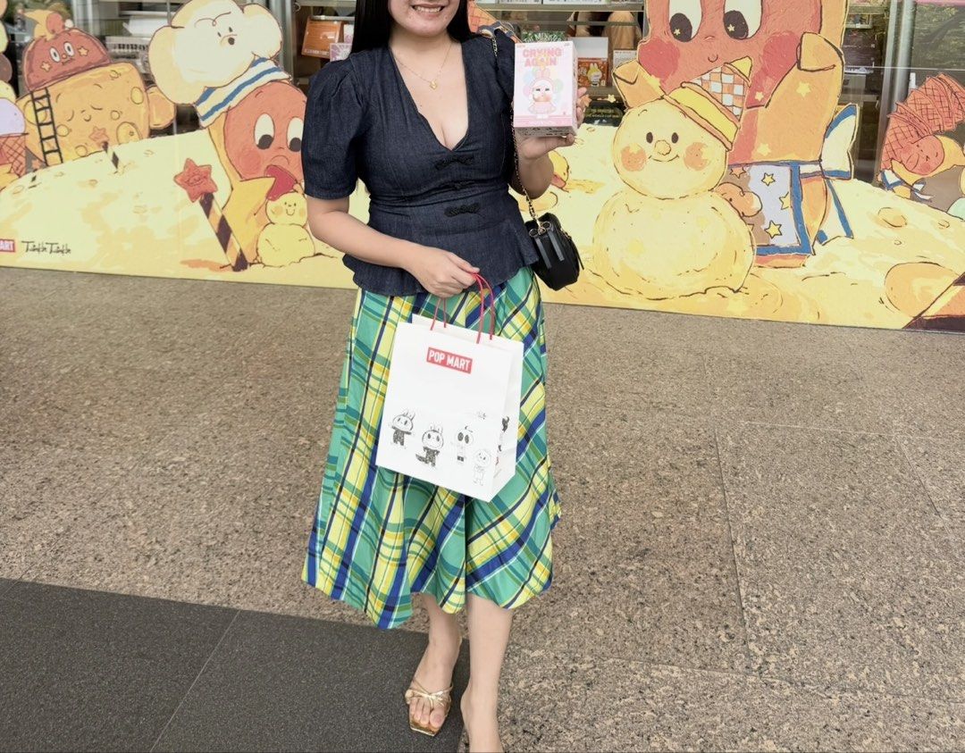 Zara Midi Skirt (Category: Skirts) located in Taguig. Submitted by princesszarashop (Listing ID 1461677662, Image 2). Description: - Size medium - Like new - Trendy midi skirt with a stylish green, blue, and yellow plaid pattern. - Flattering A-line silhouette. - Comfortable elastic waistband for a perfect fit. - Versatile piece: great for casual outings or dressing up. - Effortlessly pairs with a simple top for a complete look..