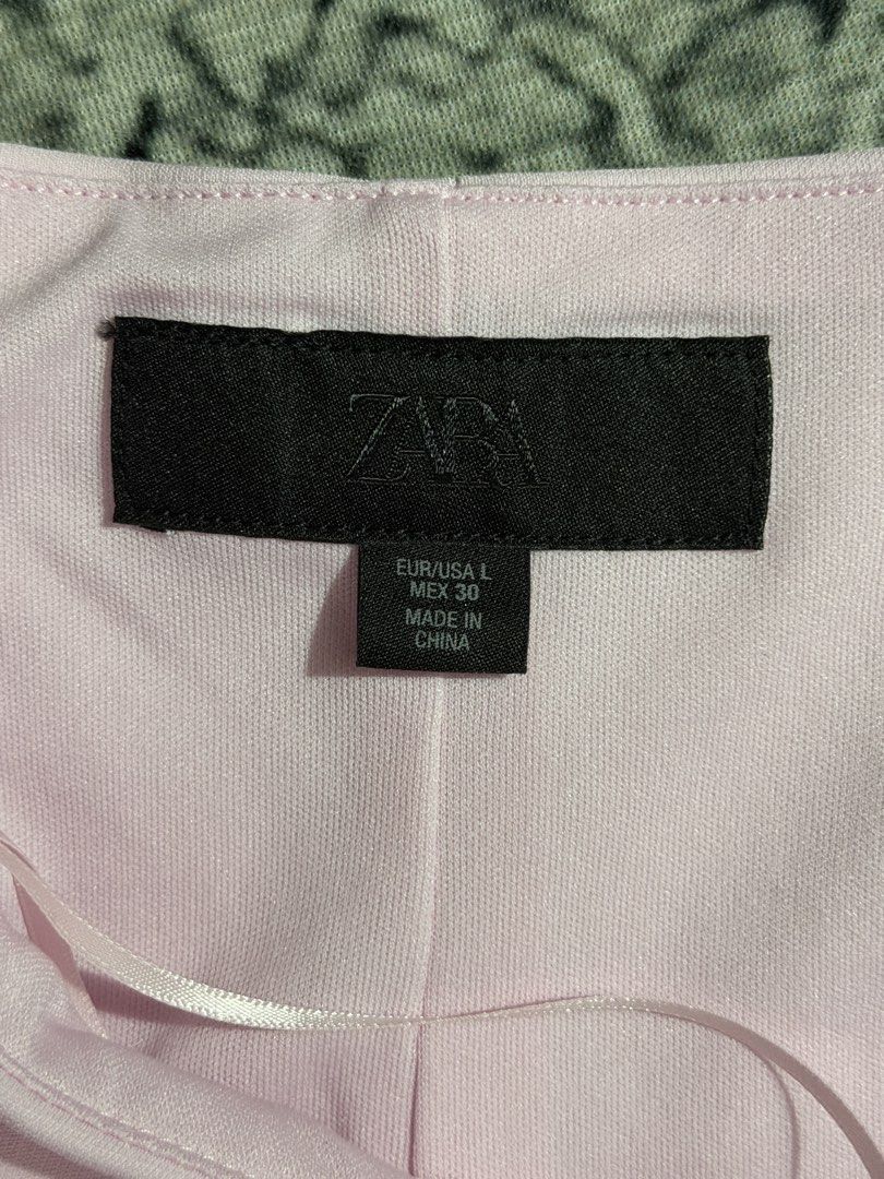 Zara Peplum Stretch Top (Category: Sleeveless) located in Manila. Submitted by bianxaakes (Listing ID 1461686708, Image 3). Description: - large size - like new, used only once! - color not too visible in the pic, see slide 4 for the actual color - delivery shouldered by the buyer - mop: gcash / bank transfer.