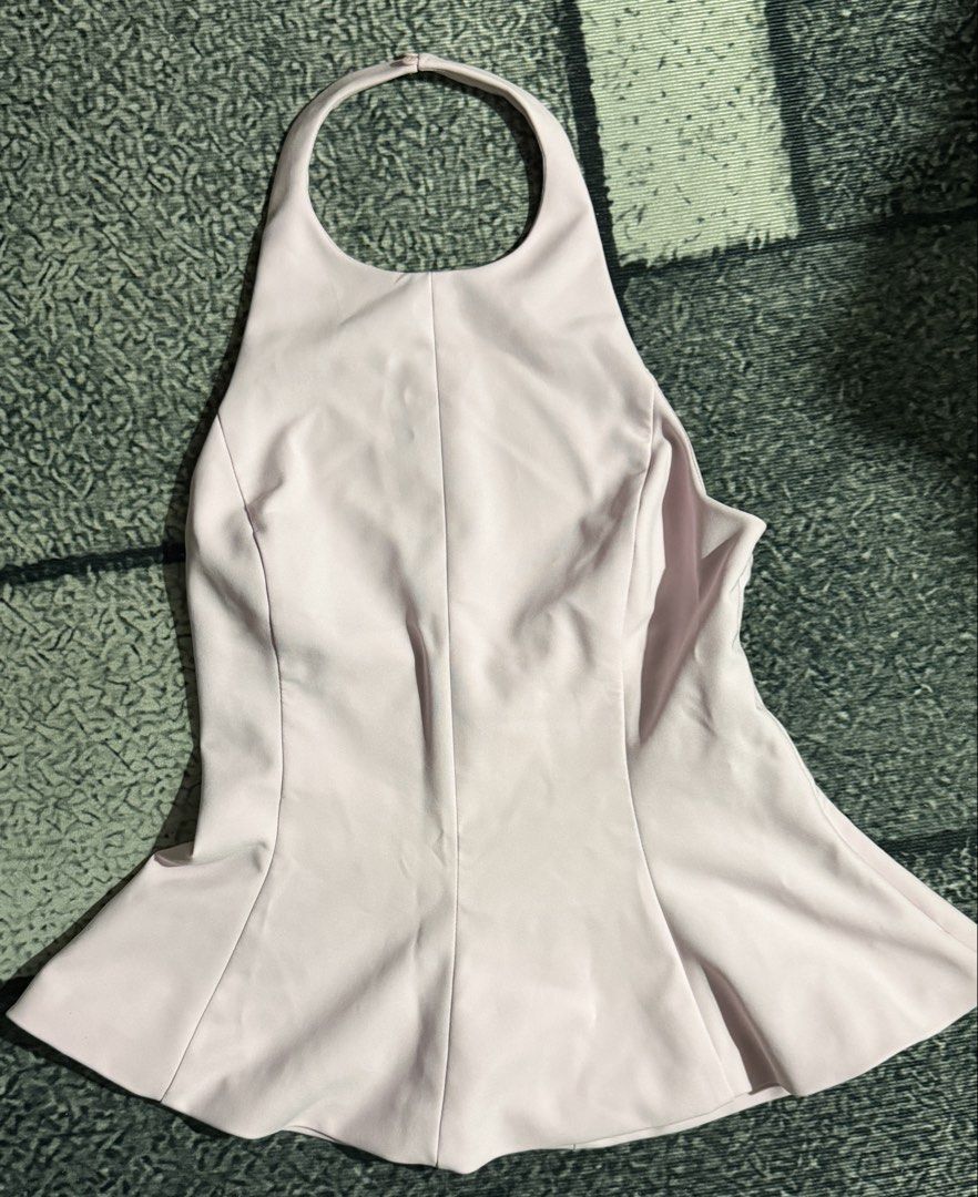 Zara Peplum Stretch Top (Category: Sleeveless) located in Manila. Submitted by bianxaakes (Listing ID 1461686708, Image 1). Description: - large size - like new, used only once! - color not too visible in the pic, see slide 4 for the actual color - delivery shouldered by the buyer - mop: gcash / bank transfer.