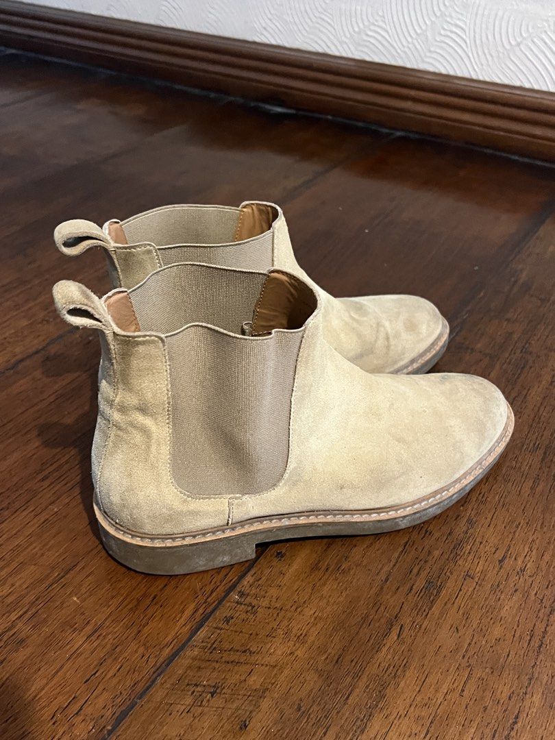 Zara Suede Chelsea Boots Size 41 (Category: Boots) located in Pasig City. Submitted by martin.as (Listing ID 1461631123, Image 1). Description: - Zara Suede Chelsea Boots - Size: 41 - Color: Light Tan/Beige - Style: Classic Chelsea with elasticated side panels - Features: Easy slip-on design - Occasion: Perfect for casual wear - Condition: Shows some signs of wear on soles and suede, but plenty of life left..
