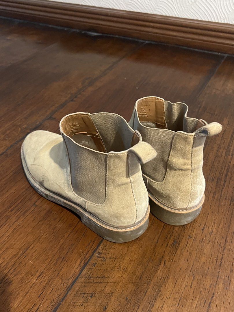 Zara Suede Chelsea Boots Size 41 (Category: Boots) located in Pasig City. Submitted by martin.as (Listing ID 1461631123, Image 3). Description: - Zara Suede Chelsea Boots - Size: 41 - Color: Light Tan/Beige - Style: Classic Chelsea with elasticated side panels - Features: Easy slip-on design - Occasion: Perfect for casual wear - Condition: Shows some signs of wear on soles and suede, but plenty of life left..