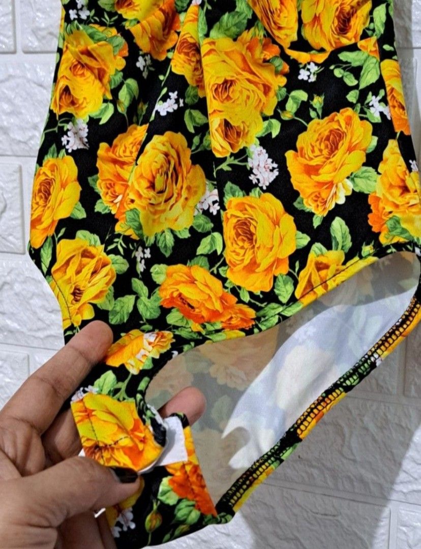 Zara Swimsuit/Bodysuit No Pads! (Category: Activewear) located in Taguig. Submitted by authprelovedonlineshop2 (Listing ID 1461695955, Image 3). Description: - Zara Swimsuit/Bodysuit - Floral print with yellow roses on black - Halter neck design - Size: S -No pads! - Made in Morocco - Great for beach trips and pool parties! Zara Bodysuit/Swimsuit Yellow Roses Floral Print Cross Front Halter Excellent Condition Small Php688 🍀All items are prelove