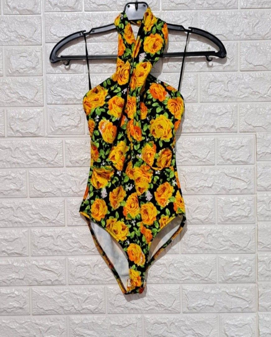 Zara Swimsuit/Bodysuit No Pads! (Category: Activewear) located in Taguig. Submitted by authprelovedonlineshop2 (Listing ID 1461695955, Image 2). Description: - Zara Swimsuit/Bodysuit - Floral print with yellow roses on black - Halter neck design - Size: S -No pads! - Made in Morocco - Great for beach trips and pool parties! Zara Bodysuit/Swimsuit Yellow Roses Floral Print Cross Front Halter Excellent Condition Small Php688 🍀All items are prelove