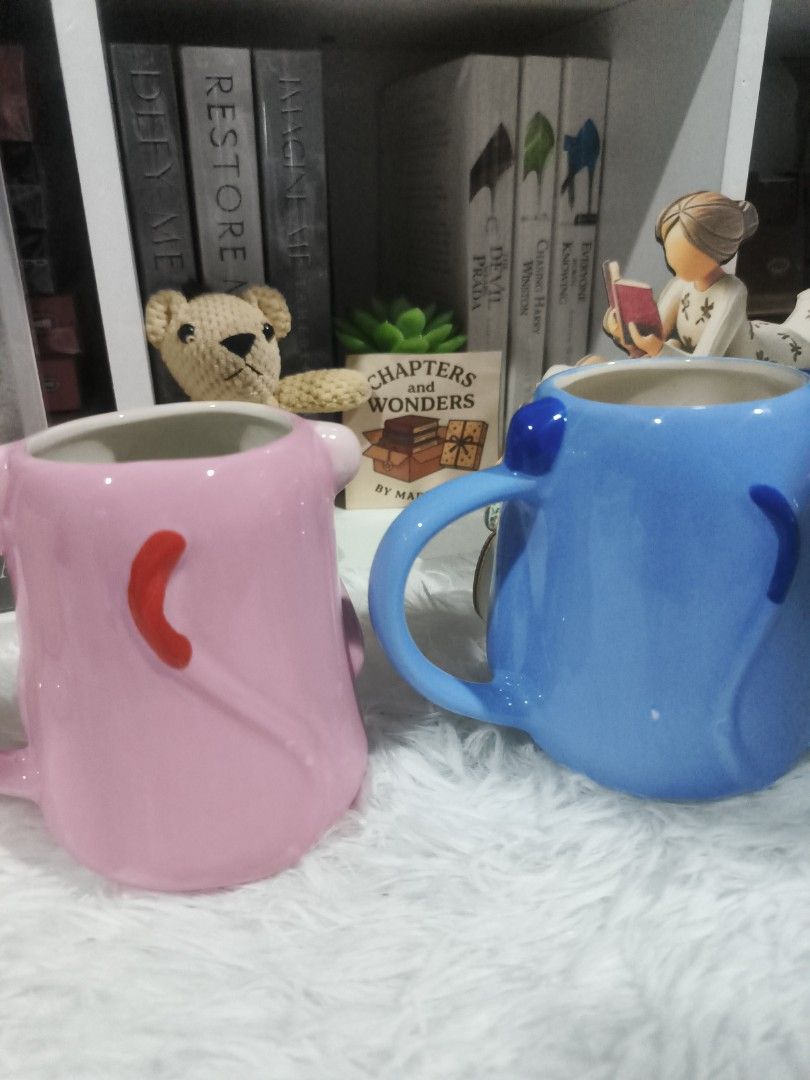 Zebra Denmark Monkey Mugs (Pink & Blue) (Category: Coffee & Tea Tableware) located in Cabuyao City. Submitted by chaptersandwonders143 (Listing ID 1461715272, Image 2). Description: - Adorable monkey design from Zebra Denmark - Available in two fun colors: pink and blue - Ideal for enjoying your favorite coffee or tea - Suitable for both kids and adults - Made in China - Makes a fantastic gift or a cheerful addition to your kitchen.