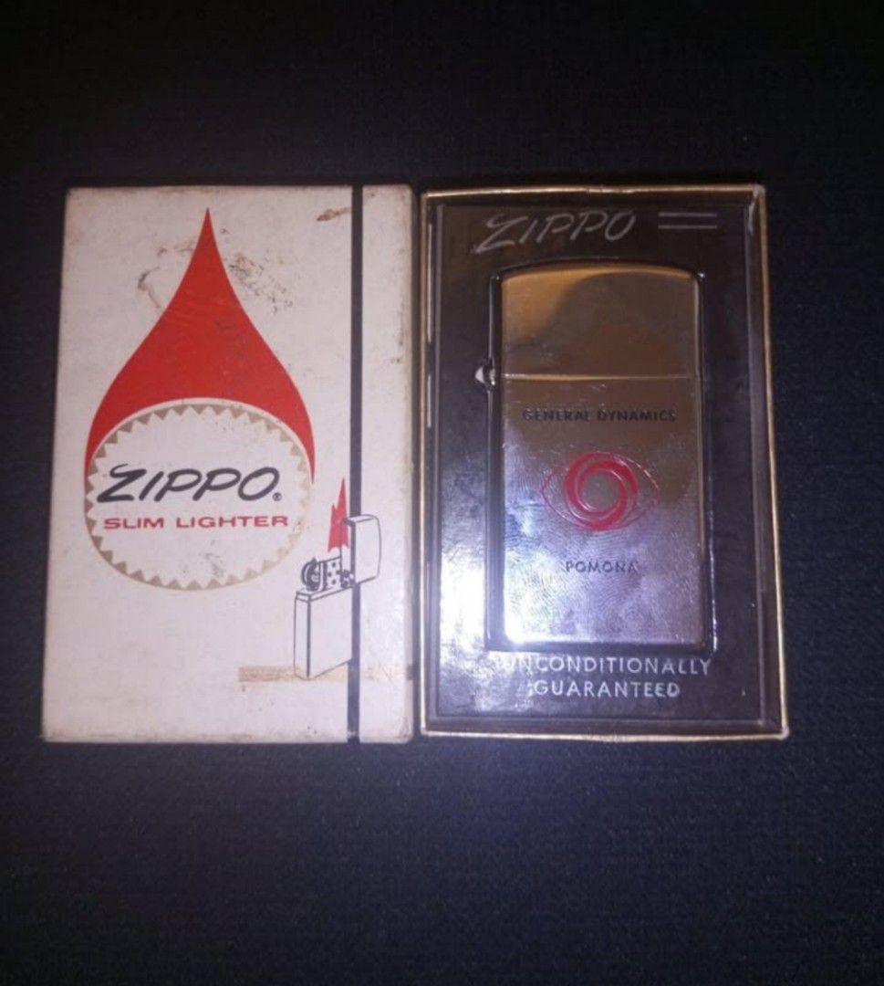 ZIPPO GENERAL DYNAMICS POMONA LIGHTER W/BOX 1962 MINT (Category: Vintage Collectibles) located in Baguio. Submitted by silentturtle.5ec778 (Listing ID 1461594304, Image 1). Description: ZIPPO GENERAL DYNAMICS POMONA LIGHTER W/BOX 1962 MINT You are bidding on a ZIPPO, GENERAL DYNAMICS, POMONA LIGHTER, MINT IN BOX. The lighter is DOUBLE SIDED EMBLEM, and features the REDEYE, HEAT SEEKING ANTI-AIRCRAFT MISSILE. The lighter looks to have never been u