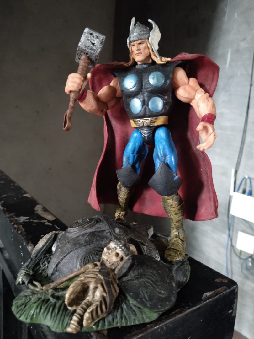 2001 Marvel Thor Action Figure with Mjolnir and Diorama Base (Category: Figurines & Statues) located in Manila. Submitted by megazordbuilderhunter (Listing ID 1461845633, Image 1). Description: - Vintage 2001 Marvel Thor action figure - Includes Mjolnir accessory - Features a detailed diorama base with a skeleton - Perfect for collectors - Made in China.
