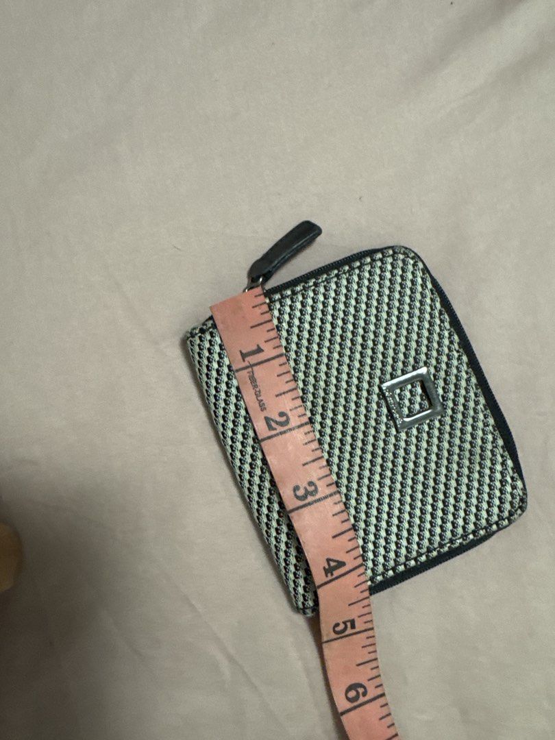 2027 Pierre Cardin Zip Around Wallet Monogram Pattern (Category: Wallets & Card holders) located in Silang. Submitted by sari2bilina (Listing ID 1461842596, Image 2). Description: - Classic Pierre Cardin monogram design - Secure zip-around closure - Multiple interior compartments for cards and cash - Compact and easy to carry - Perfect for everyday essentials.