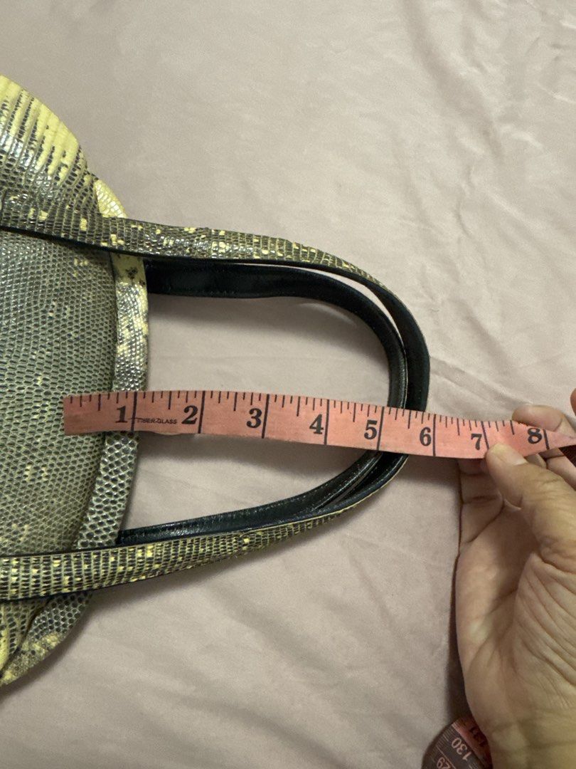 2027 Vintage Lizard Print Top Handle Bag (Category: Luxury Bags & Wallets) located in Silang. Submitted by sari2bilina (Listing ID 1461830666, Image 3). Description: - Unique vintage handbag - Lizard print exterior - Color: Mix of yellow and grey - Structured shape - Clasp closure - Interior: 1 zippered pocket, 1 slip pocket - Black handles - Approximate measurements: 8 inches tall, 11 inches wide flaws shown last 2 pics ( need dikitan).