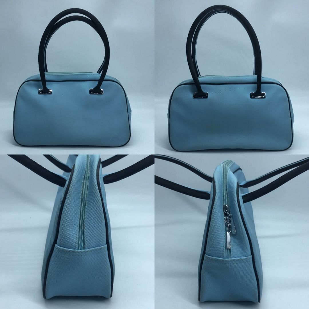 267009022 LACOSTE BAG BOSTON BLUE BOWLING (Category: Luxury Bags & Wallets) located in Taguig. Submitted by ecoring.ph (Listing ID 1461821939, Image 2). Description: ◆CONDITION: B ◆DESCRIPTIONS: (Other defects/info:) OUTER: The body of the bag is scratched, scuffed, stained, dirty, has press marks, minimal discoloration, and shows signs of use. The bottom and bottom corners of the bag are also scratched, scuffed, stained, dirty, have press marks,