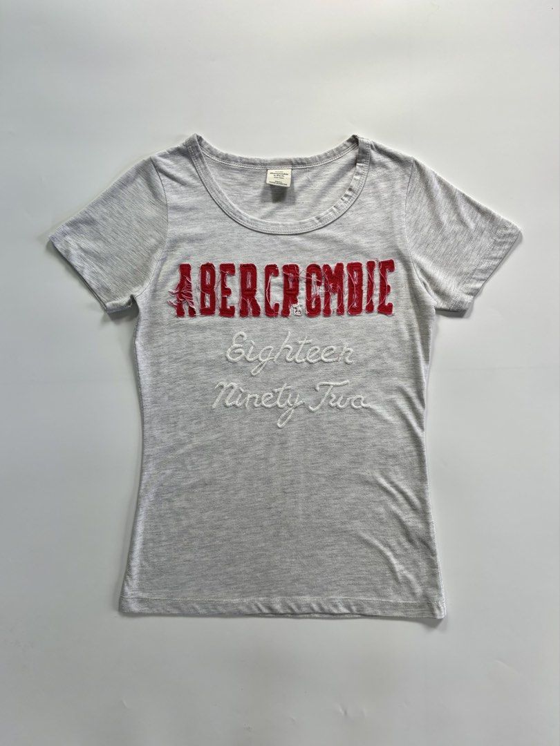Abercrombie Tee (S) (Category: Shirts) located in Baguio. Submitted by thr1ft_junki3 (Listing ID 1461953043, Image 1). Description: Small on tag Flaws: Distressed embroidery .