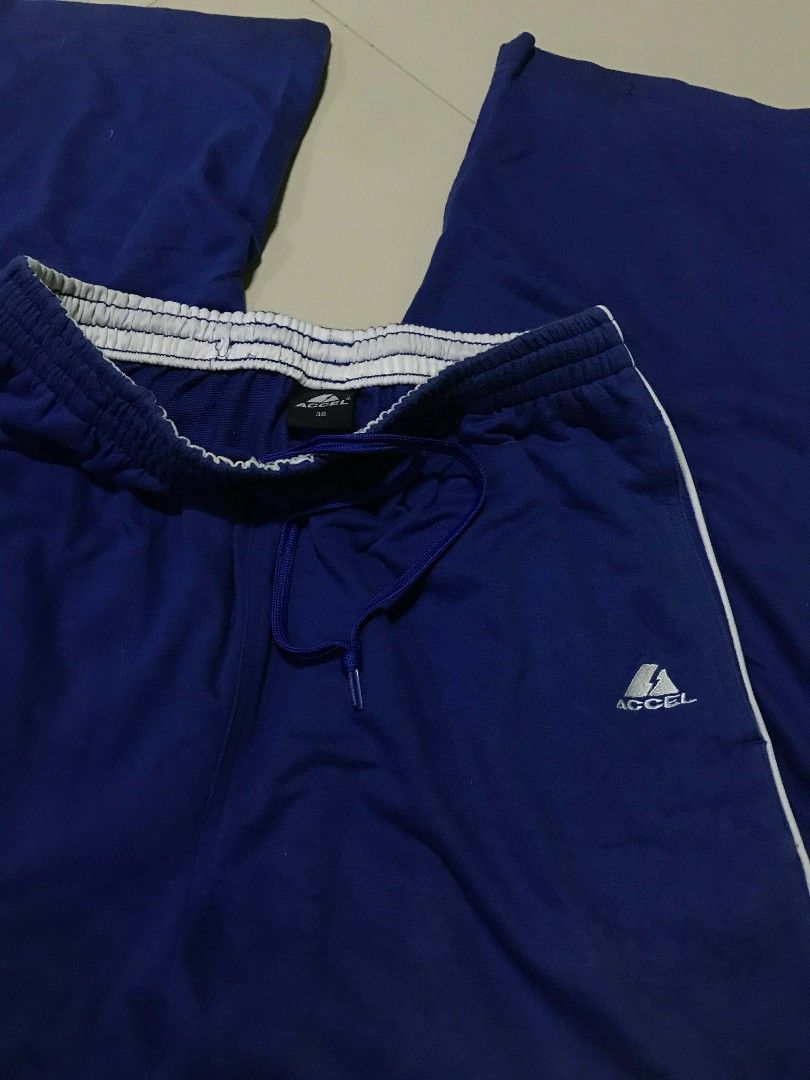 Accel Blue Polyester Track Pants with White Stripes (Category: Activewear) located in Quezon City. Submitted by carlodepaz (Listing ID 1461955206, Image 2). Description: Waist - 30 to 36 Length -41 Thigh - 14 Leg open - 10 price - 250 freeship.