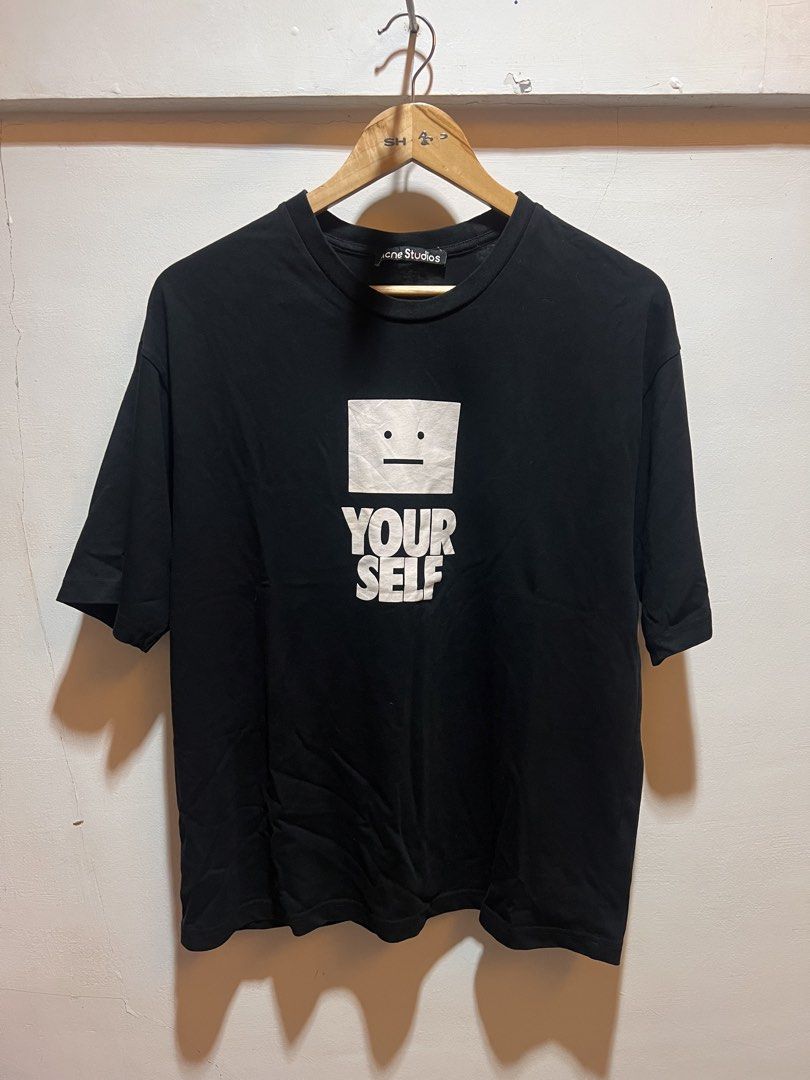 Acne Studios Black "YOUR SELF" Graphic T-Shirt (Category: Tshirts & Polo Shirts ) located in San Juan, La Union. Submitted by jeggystyle (Listing ID 1461964725, Image 2). Description: - Acne Studios black t-shirt - Features 'YOUR SELF' graphic print on the front - Classic crew neck and short sleeves - Plain black on the back - Made from good quality cotton - Ideal for everyday casual wear.