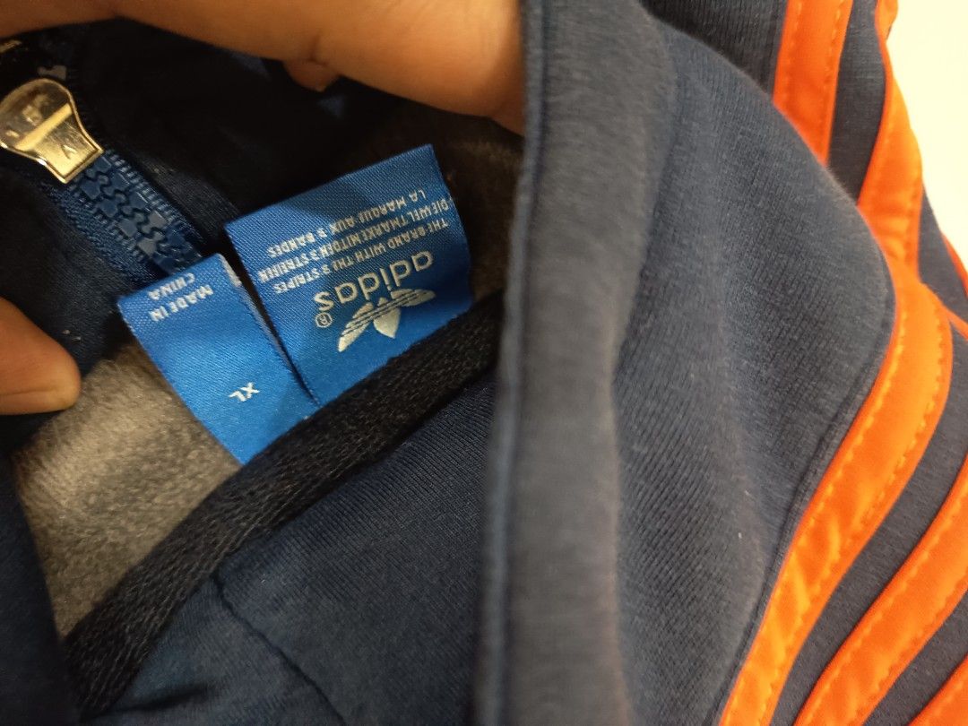 ADIDAS (Category: Coats, Jackets and Outerwear) located in Manila. Submitted by skippypeanut1331 (Listing ID 1461967470, Image 3). Description: 23x27 XL Very Good condition Color rate: 8.9/10 issue: minimal stain.