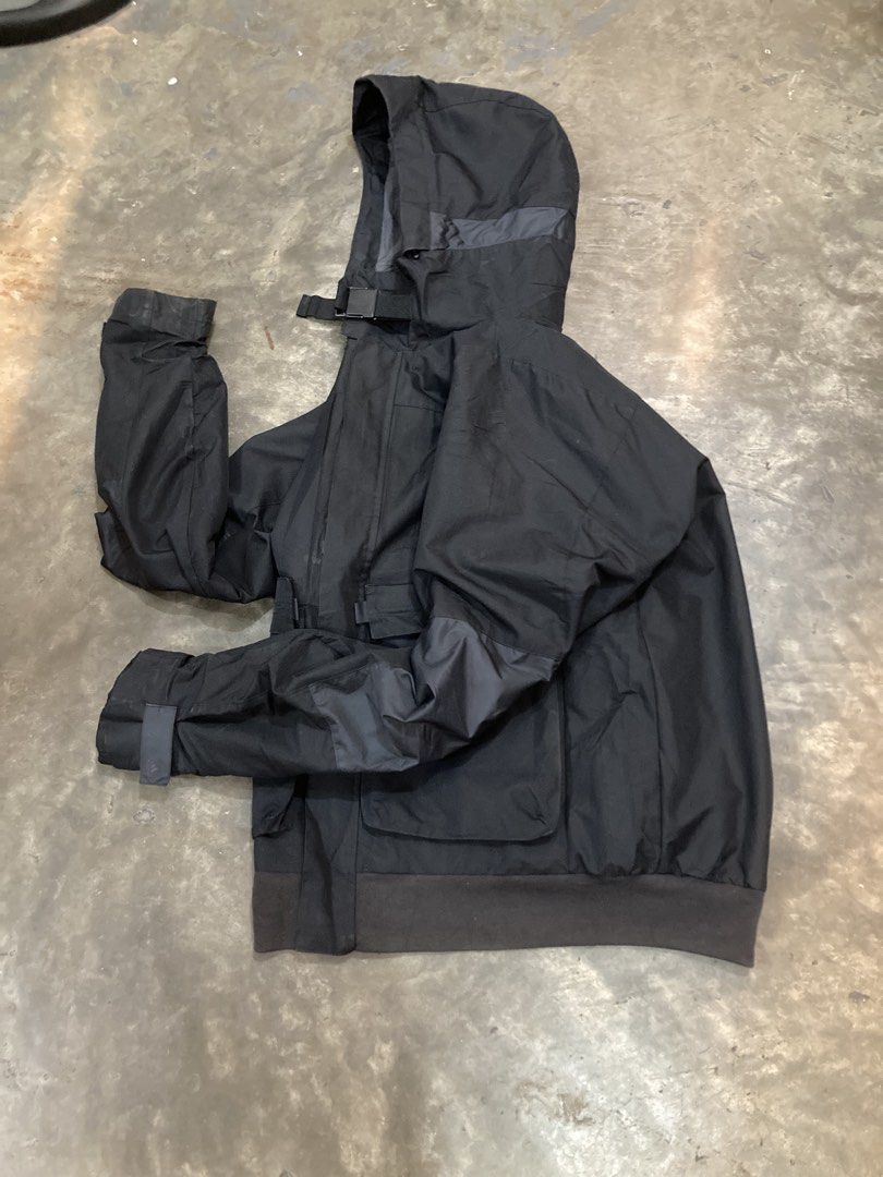 Adidas Black Hooded Jacket (Category: Coats, Jackets and Outerwear) located in Trece Martires City. Submitted by thriftkoto.91 (Listing ID 1461924863, Image 2). Description: - Black Adidas jacket - Hooded design - Multiple front pockets - Adjustable hood and sleeve straps - Zipper closure - Ideal for outdoor activities and casual wear.