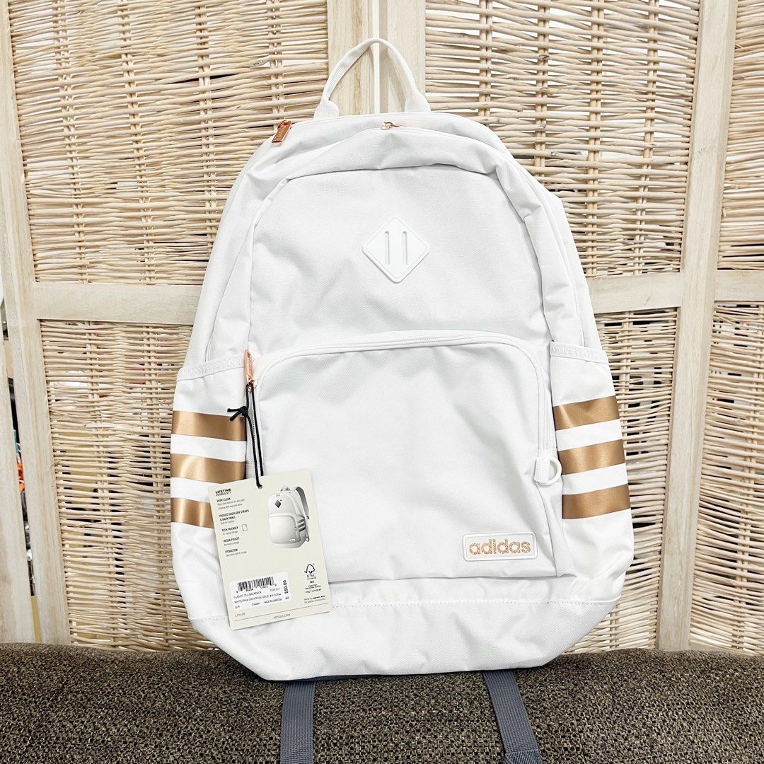 Adidas Classic 3S 4 Backpack White/Rose Gold (Category: Backpacks) located in San Remigio. Submitted by shop.rhea.usa (Listing ID 1461841118, Image 1). Description: P1,500 Payment method: BPI Payment first before shipping No reservations 100% authentic from USA - Stylish white Adidas backpack with chic rose gold accents. - Padded shoulder straps and back panel for ultimate comfort. - Tech-ready with a dedicated 15" laptop pocket. - Additional med