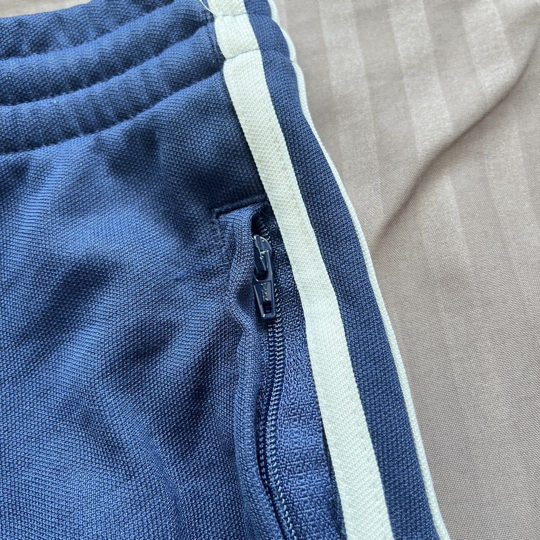 Adidas Navy Blue 3-Stripes Shorts (Category: Shorts) located in Cagayan de Oro. Submitted by aeiith (Listing ID 1462032655, Image 3). Description: - Navy blue Adidas shorts - Classic 3-stripes design on sides - Elastic waistband with drawstring for adjustable fit - Small Adidas logo on left leg - Ideal for casual wear or sports activities.