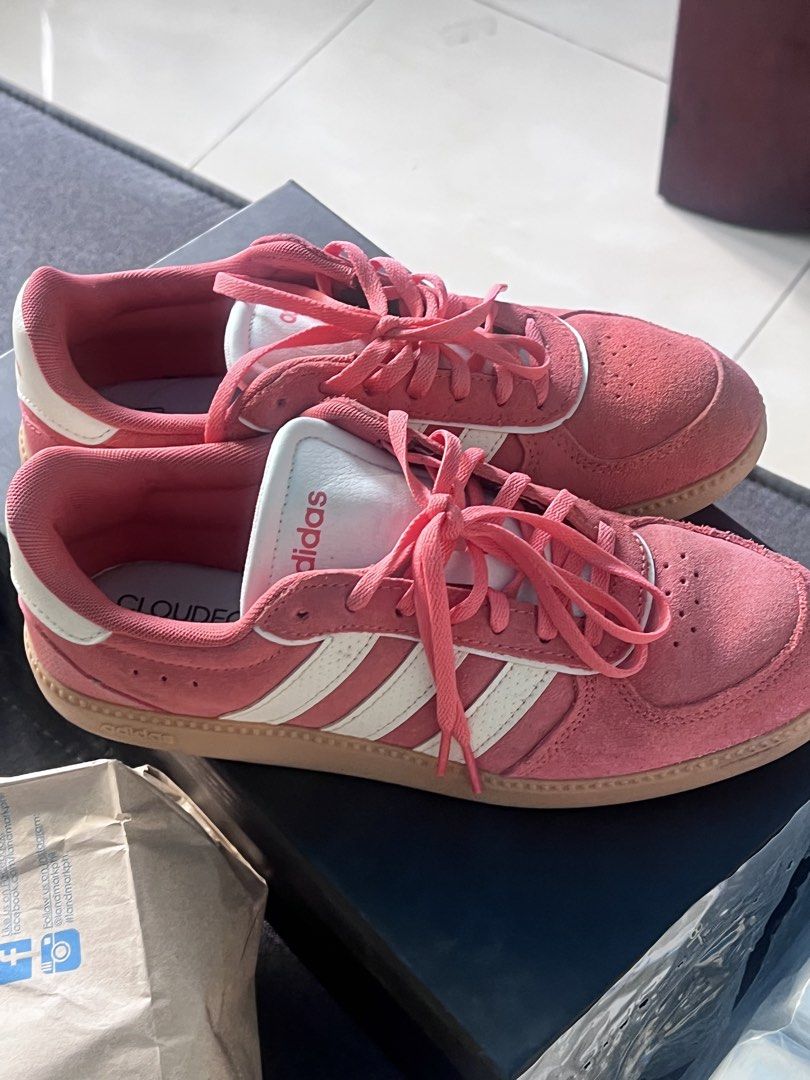 Adidas Pink Suede Sneakers (Category: Sneakers) located in Manila. Submitted by cleverstone_21f597 (Listing ID 1461829469, Image 1). Description: - Pink Adidas sneakers - Suede material with classic white stripes - Lace-up closure for a secure fit - Made in Indonesia - Size: 7.5 UK / 39.5 EU - Ideal for everyday casual wear.