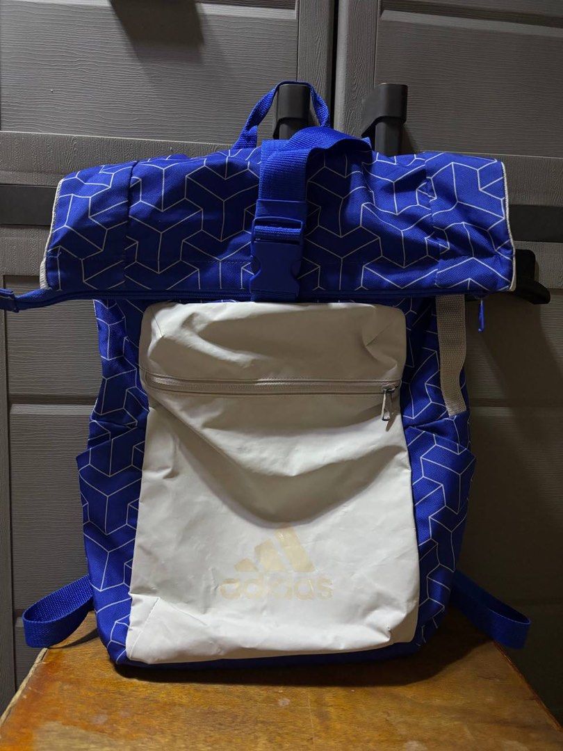 Adidas Roll Top Backpack Blue Geometric Pattern (Category: Backpacks) located in Pasig City. Submitted by abogadosupremo (Listing ID 1461803014, Image 2). Description: Adidas Roll Top Core Backpack Blue Geometric Pattern - Blue Adidas roll top backpack - All-over geometric pattern - White front zip pocket - Padded straps for comfort - Spacious interior - Ideal for school or gym - Legit no issue - Very good condition .