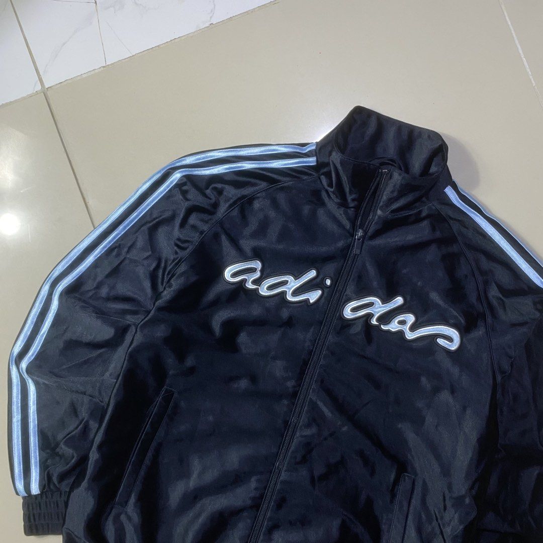 ADIDAS SCRIPT LOGO TRACK JACKET (Category: Coats, Jackets and Outerwear) located in Manila. Submitted by aym_fortunate (Listing ID 1461937447, Image 2). Description: • Adidas Script Logo Track Jacket • DIMES. WIDTH : 22 LENGTH : 26 COLOR RATE / CONDITION : 9.5/10 ISSUE : CHECK COMMENT SEC. EXCELLENT CONDITION..