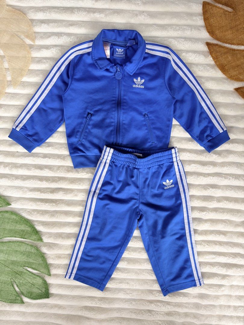 Adidas track suit terno - Blue 24M (Category: Babies & Kids Fashion) located in La Trinidad. Submitted by true_kidsclothing (Listing ID 1461876036, Image 1). Description: 𝙎𝙞𝙯𝙚 𝙤𝙣 𝙩𝙖𝙜: 24 months 💯Legit / Authentic 📌Excellent used condition 📌Color rate: 9.8/10 .