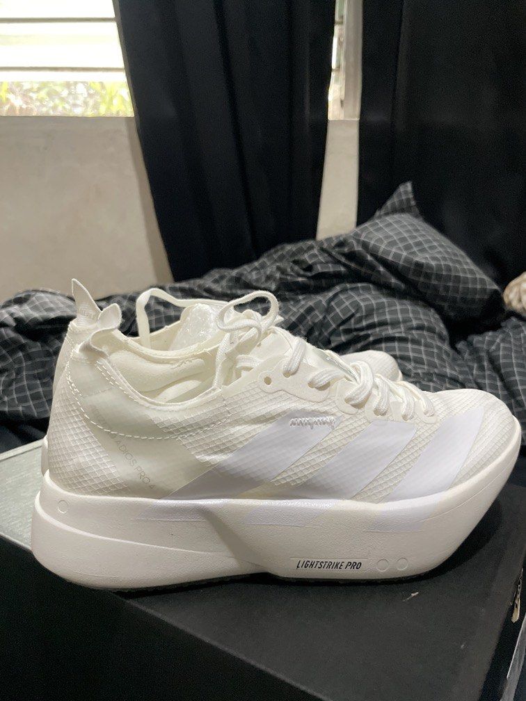 ADIZERO ADIOS PRO 4 in White (Category: Sneakers) located in Manila. Submitted by adhiik (Listing ID 1461809186, Image 3). Description: Class A but good quality, bought for duty but had a change of mind and can’t return it anymore. buy niyo na pls pls not ako scammer, may spending guilt lang huhu US: 7 1/2 UK: 6 .