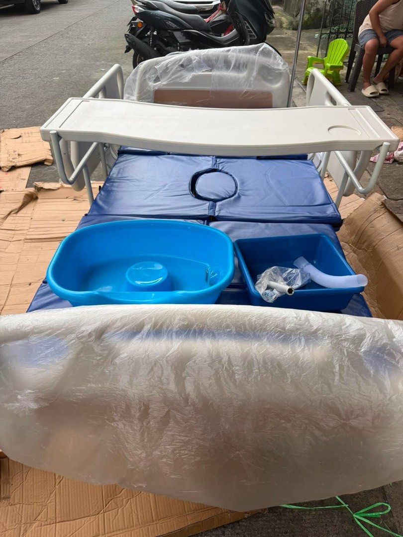 Adjustable Hospital Bed with Accessories (Category: Medical Supplies & Tools) located in Manila. Submitted by rosel2001 (Listing ID 1461832502, Image 1). Description: - Adjustable hospital bed for home care needs - Comes with a tray, wash basin, and IV pole - Equipped with wheels for easy movement - Includes mattress and protective covers - Ready for its new owner.