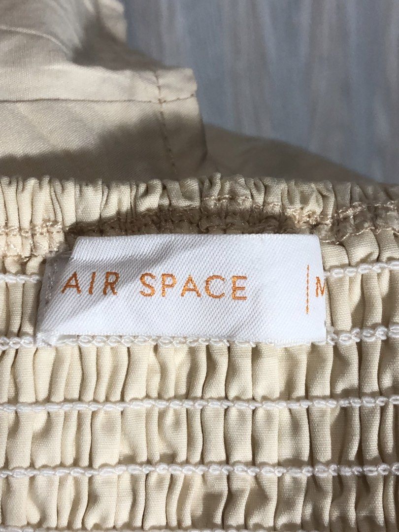 AIR SPACE Cream Smocked Back Crop Top Size M (Category: Sleeveless) located in Montevista. Submitted by rdthriftshub (Listing ID 1461909037, Image 3). Description: - Cream colored crop top from AIR SPACE - Size Medium - Smocked back for a comfortable fit - Adjustable spaghetti straps - V-neckline - Versatile for casual or dressed-up looks.