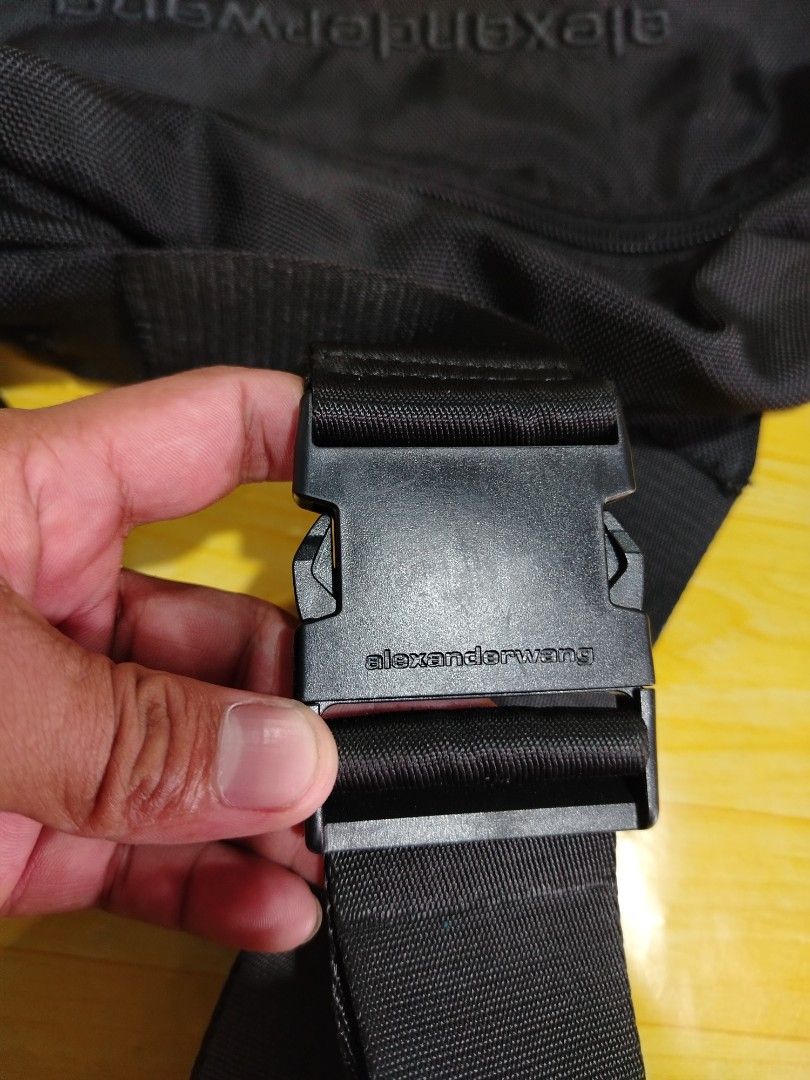 Alexander Wang Black Nylon Fanny Pack (Category: Luxury Bags & Wallets) located in Lucena. Submitted by thrifteditem (Listing ID 1461834987, Image 2). Description: - Authentic Alexander Wang Fanny Pack - Color: Black - Origin: Made in Vietnam - Stylish chunky chain detail on strap - Secure buckle closure - Multiple zippered compartments for organization - Ideal for keeping your essentials easily accessible.