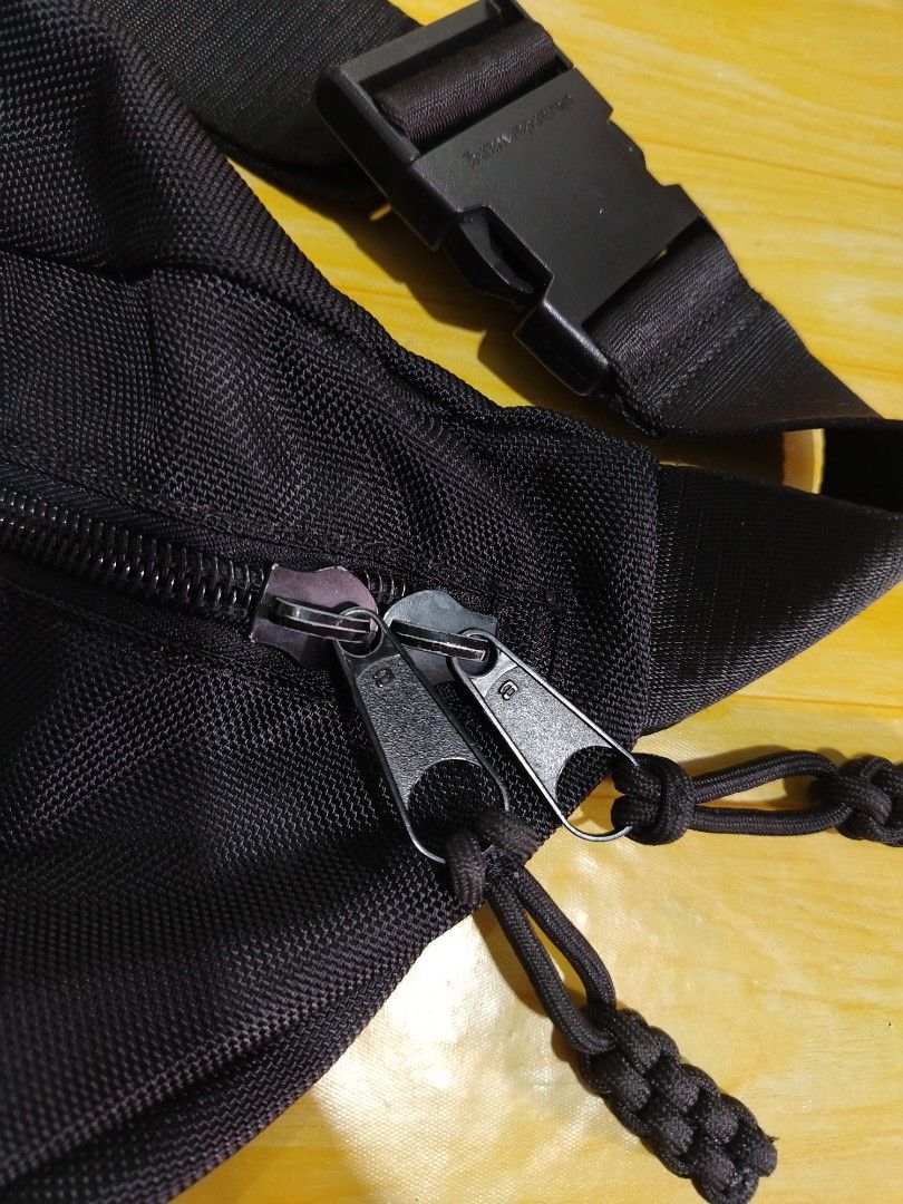 Alexander Wang Black Nylon Fanny Pack (Category: Luxury Bags & Wallets) located in Lucena. Submitted by thrifteditem (Listing ID 1461834987, Image 3). Description: - Authentic Alexander Wang Fanny Pack - Color: Black - Origin: Made in Vietnam - Stylish chunky chain detail on strap - Secure buckle closure - Multiple zippered compartments for organization - Ideal for keeping your essentials easily accessible.