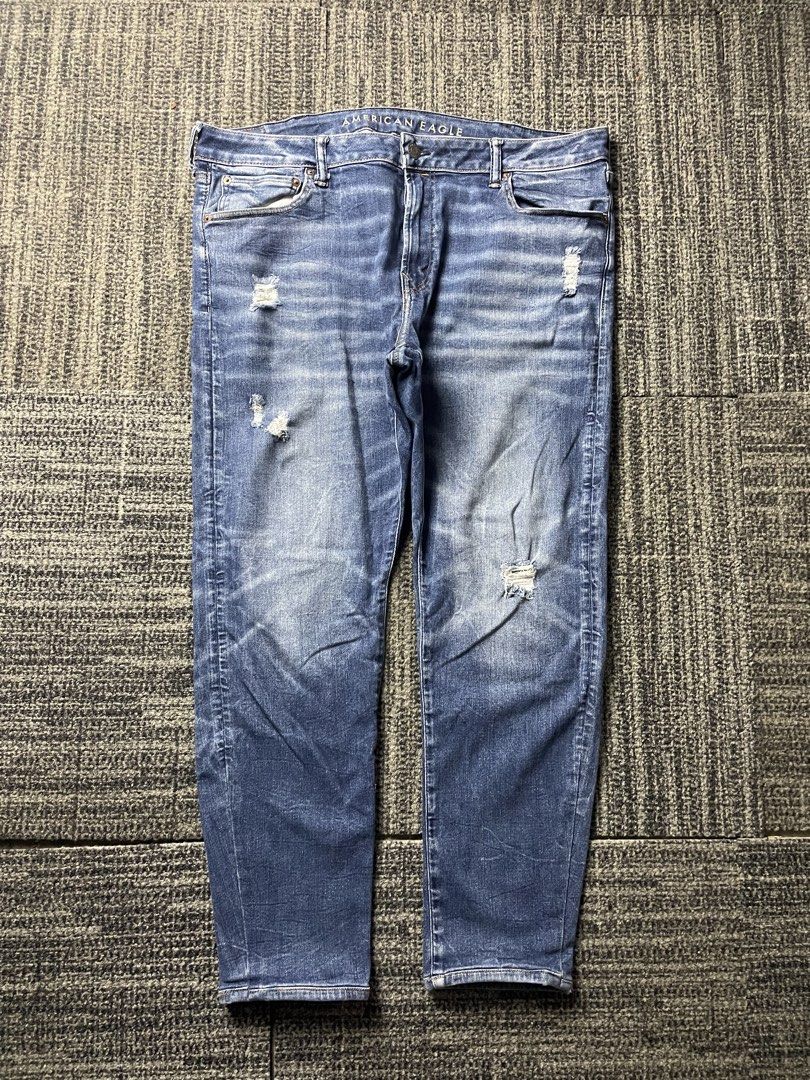 American Eagle Slim Distressed Blue Denim Stretchable Jeans (Category: Jeans) located in Taguig. Submitted by highlows (Listing ID 1461829329, Image 1). Description: waistline 42 length 39 hem 6 no flaw excellent condition 9.5/10.