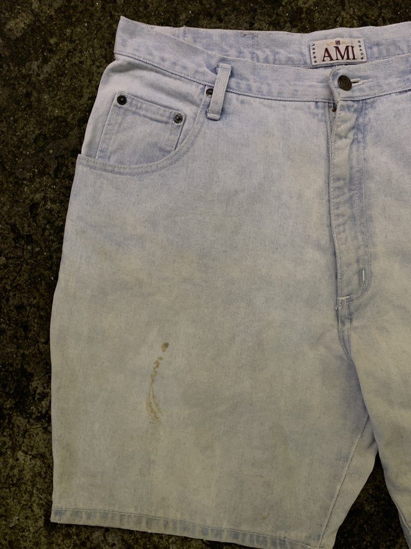 AMI Light Wash Denim Shorts (Category: Shorts) located in Manila. Submitted by loyspalencia (Listing ID 1461848546, Image 3). Description: - Light wash denim shorts from AMI - Classic five-pocket design - Button and zip fly closure - Features a faded, worn-in look - Small stain present on the front left leg - Ideal for everyday casual wear - Dimes: W-20 / L-19 / Waistline -16 / Helm-11.