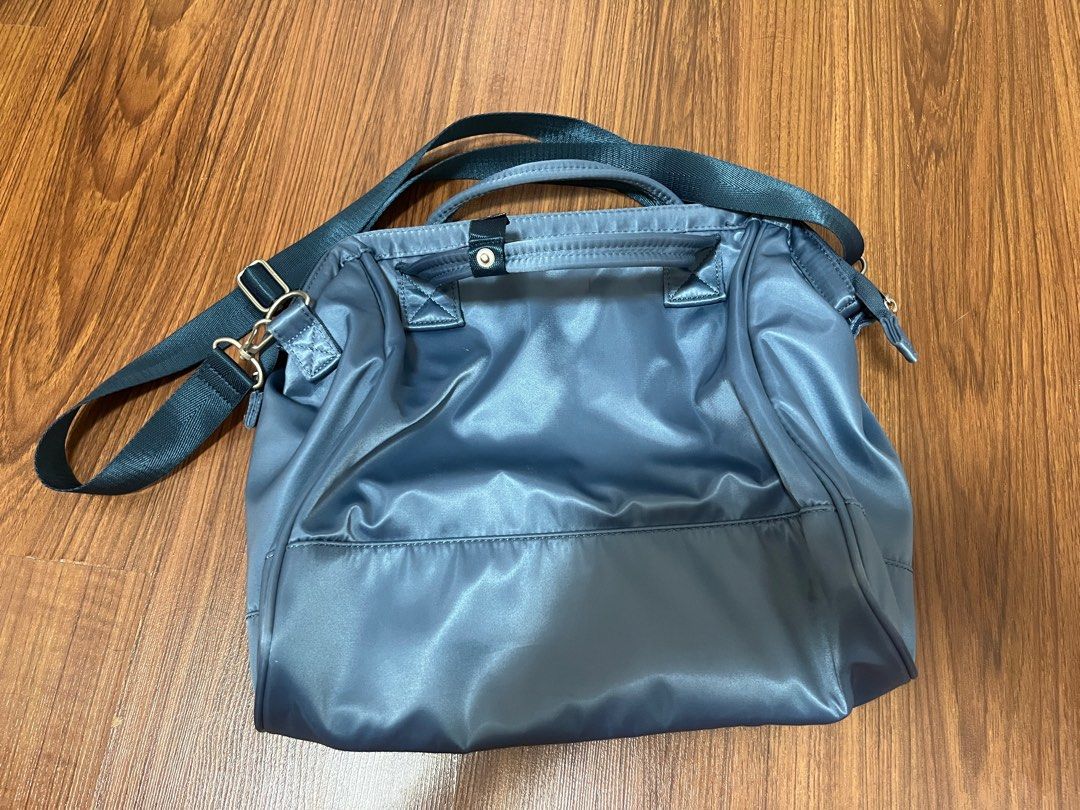 Anello sling bag (Category: Cross-body Bags) located in Manila. Submitted by mingciao (Listing ID 1461887576, Image 3). Description: Please read the description first‼️ Original price: ₱3k+ Details: ★ Authentic anello sling bag (bought it sa shangrila mall) ★ Water repellent ★ Used once only ★ Can fit a 13 to 14 inch laptop (check the attached photo) ★ Issue: none ★ Rfs: decluttering ★ Inclusions: bag, strap and free strawberry pouch ‼️REMINDERS 