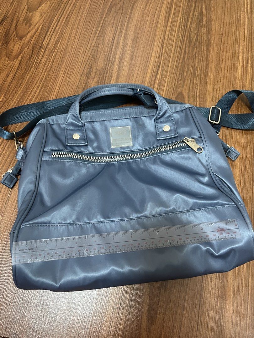 Anello sling bag (Category: Cross-body Bags) located in Manila. Submitted by mingciao (Listing ID 1461887576, Image 2). Description: Please read the description first‼️ Original price: ₱3k+ Details: ★ Authentic anello sling bag (bought it sa shangrila mall) ★ Water repellent ★ Used once only ★ Can fit a 13 to 14 inch laptop (check the attached photo) ★ Issue: none ★ Rfs: decluttering ★ Inclusions: bag, strap and free strawberry pouch ‼️REMINDERS 