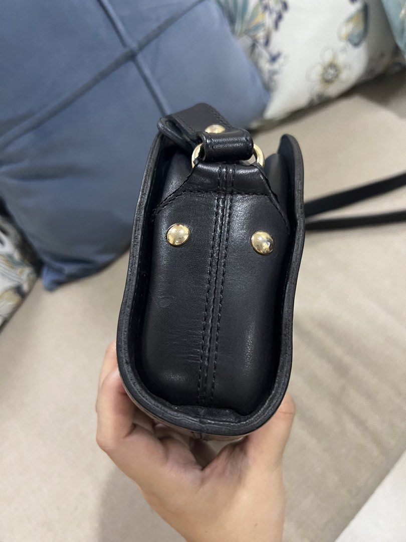APC Black Demi Lune Bag (Category: Cross-body Bags) located in Binan City. Submitted by alreadyloved.p (Listing ID 1461966899, Image 3). Description: Black color calf leather gold-tone logo lettering curve-edge body adjustable shoulder strap top zip fastening internal logo patch cotton lining measurements Width: 23 cm (9.05 in) Height: 20 cm (7.87 in) Strap: 50 cm (19.68 in) Depth: 8 cm (3.14 in).