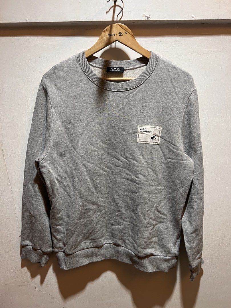 A.P.C. Grey Crewneck Sweatshirt (Category: Coats, Jackets and Outerwear) located in San Juan, La Union. Submitted by jeggystyle (Listing ID 1461963840, Image 1). Description: - Grey A.P.C. crewneck sweatshirt - Features a small graphic patch on the chest - Classic crewneck design - Ribbed cuffs and hem for a comfortable fit - Versatile for everyday wear and layering Fits large.