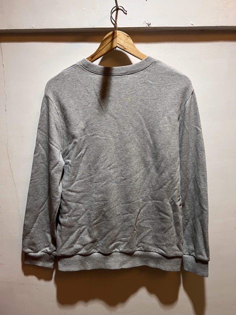 A.P.C. Grey Crewneck Sweatshirt (Category: Coats, Jackets and Outerwear) located in San Juan, La Union. Submitted by jeggystyle (Listing ID 1461963840, Image 3). Description: - Grey A.P.C. crewneck sweatshirt - Features a small graphic patch on the chest - Classic crewneck design - Ribbed cuffs and hem for a comfortable fit - Versatile for everyday wear and layering Fits large.