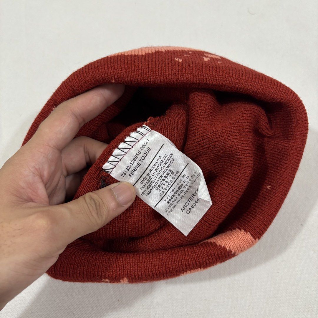 Arc'teryx Beanie - Red and Orange Pattern (Category: Caps & Hats) located in Cavite. Submitted by itsayaaa (Listing ID 1462010499, Image 2). Description: Arc’teryx Grotto Toque Beanie Issue: No issue Condition: Excellent Condition STARTING BID: 150 INCREMENT: 50 CLAIM: 📥.
