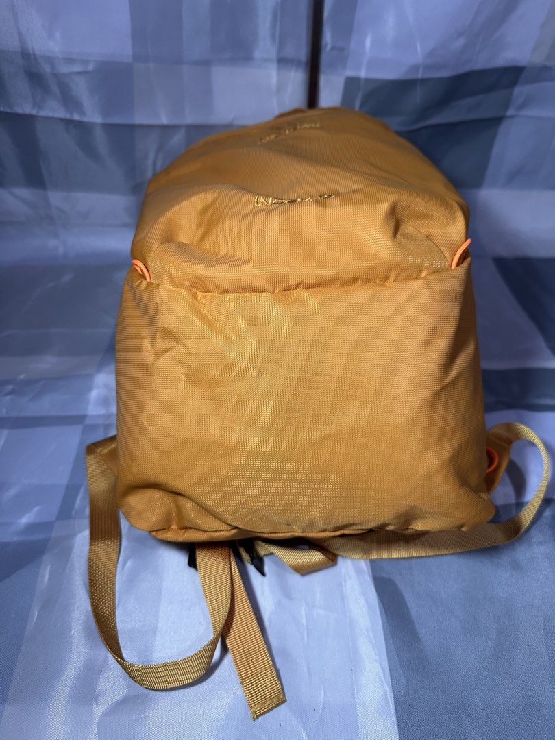 Arc'teryx Index 15 Backpack - Mustard Yellow (Category: Backpacks) located in Cavite. Submitted by bags_unltd143 (Listing ID 1461840238, Image 3). Description: - Arc'teryx Index 15 backpack - Color: Mustard Yellow - Lightweight and packable design - Main compartment with internal organization - Front zip pocket for quick access - Adjustable shoulder straps - Ideal for travel or daily use.
