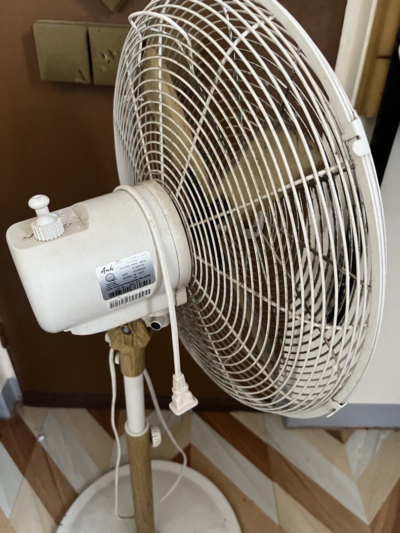 Asahi Stand Fan wooden design (Category: Fans) located in Dagupan City. Submitted by 2400forlife (Listing ID 1461823898, Image 2). Description: - Asahi Stand Fan - Model: XF-6077 - Size: 16 inches (405mm) - Power: 70 Watts, 230V, 60Hz - Safety Feature: Built-in thermal fuse - Adjustable height - In excellent working condition.