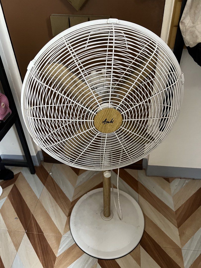 Asahi Stand Fan wooden design (Category: Fans) located in Dagupan City. Submitted by 2400forlife (Listing ID 1461823898, Image 1). Description: - Asahi Stand Fan - Model: XF-6077 - Size: 16 inches (405mm) - Power: 70 Watts, 230V, 60Hz - Safety Feature: Built-in thermal fuse - Adjustable height - In excellent working condition.