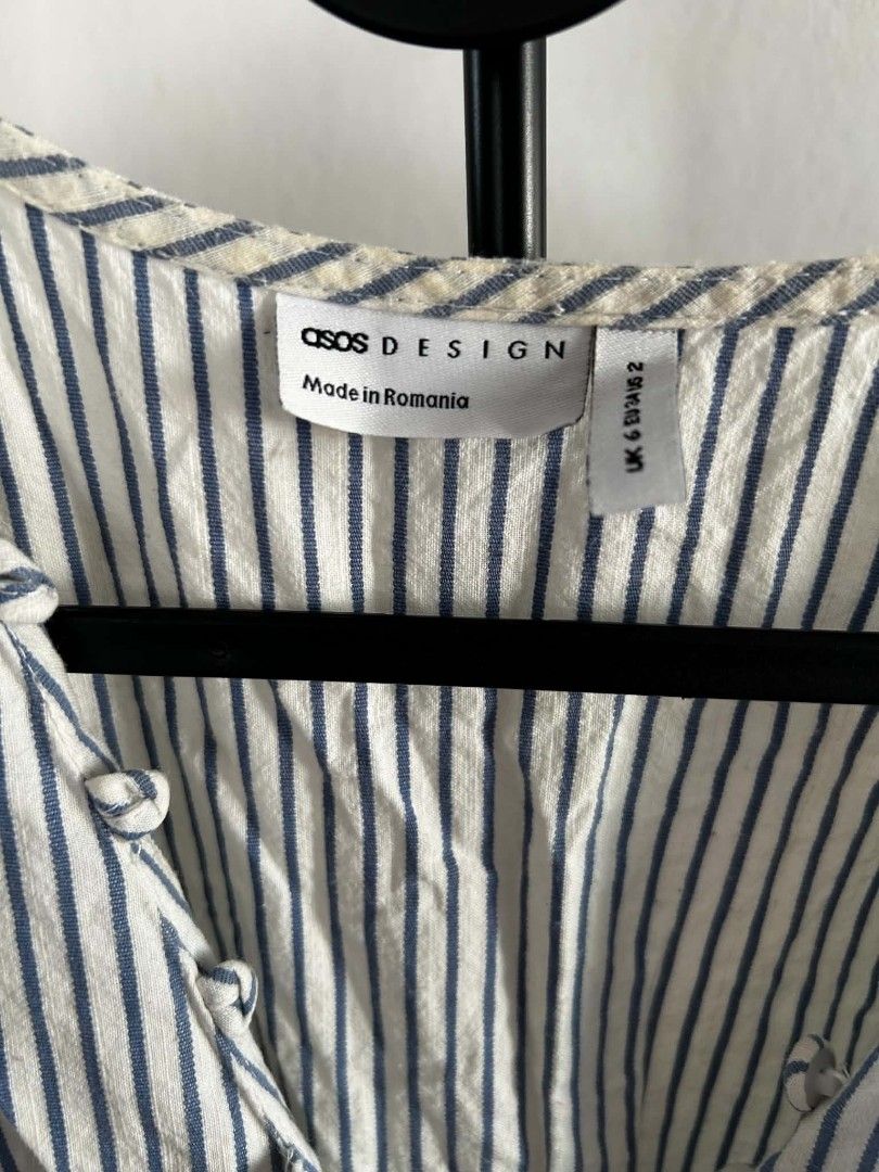 ASOS DESIGN Striped Button Front Midi Dress (Category: Dresses) located in Carmona. Submitted by av067t (Listing ID 1461918983, Image 3). Description: - ASOS DESIGN blue and white striped mini dress - V-neck with button details - Elasticated waist with gathered skirt - 3/4 sleeves with tie details - Made of 100% cotton - Ideal for casual wear.