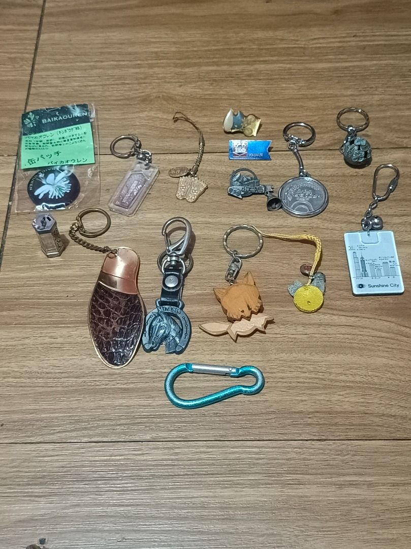 Assorted collection of keychains and pins (Category: Vintage Collectibles) located in Makati City. Submitted by nyxhemera26 (Listing ID 1461994052, Image 1). Description: Assorted collection of keychains and pins 📌All items for anik bundles are sold as is - Mostly souvenirs from Japan (Yokohama, Sunshine City). - Includes: horseshoe with horse, unique leather-look keychain, small bell. - Also features pins, including one with a cyclist and '2003