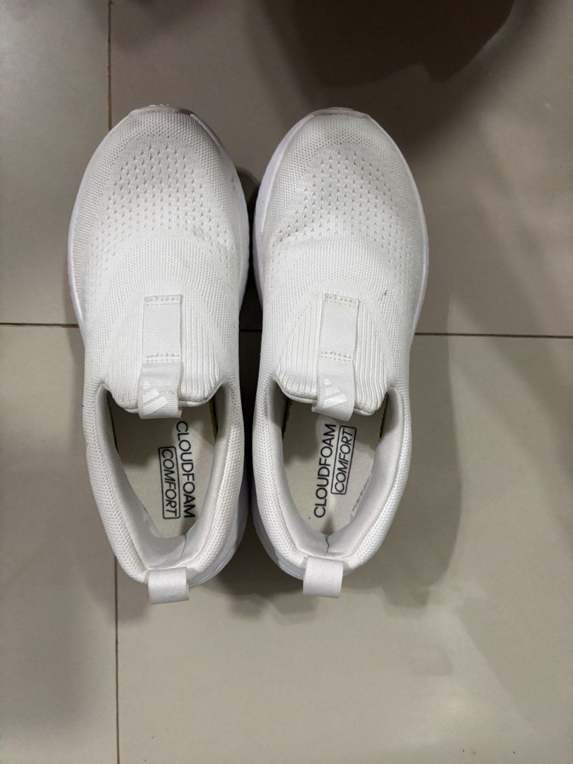 Authentic Adidas Cloudfoam Walk Slip-On Sneakers White (Category: Sneakers) located in Paranaque City. Submitted by emjayselltheirstuff (Listing ID 1461877960, Image 2). Description: - White Adidas slip-on sneakers -Size: US 6.5/UK 4.5 - Features Cloudfoam Comfort sole for excellent cushioning - Effortless slip-on design for easy wear - Perfect for everyday activities and casual outings.