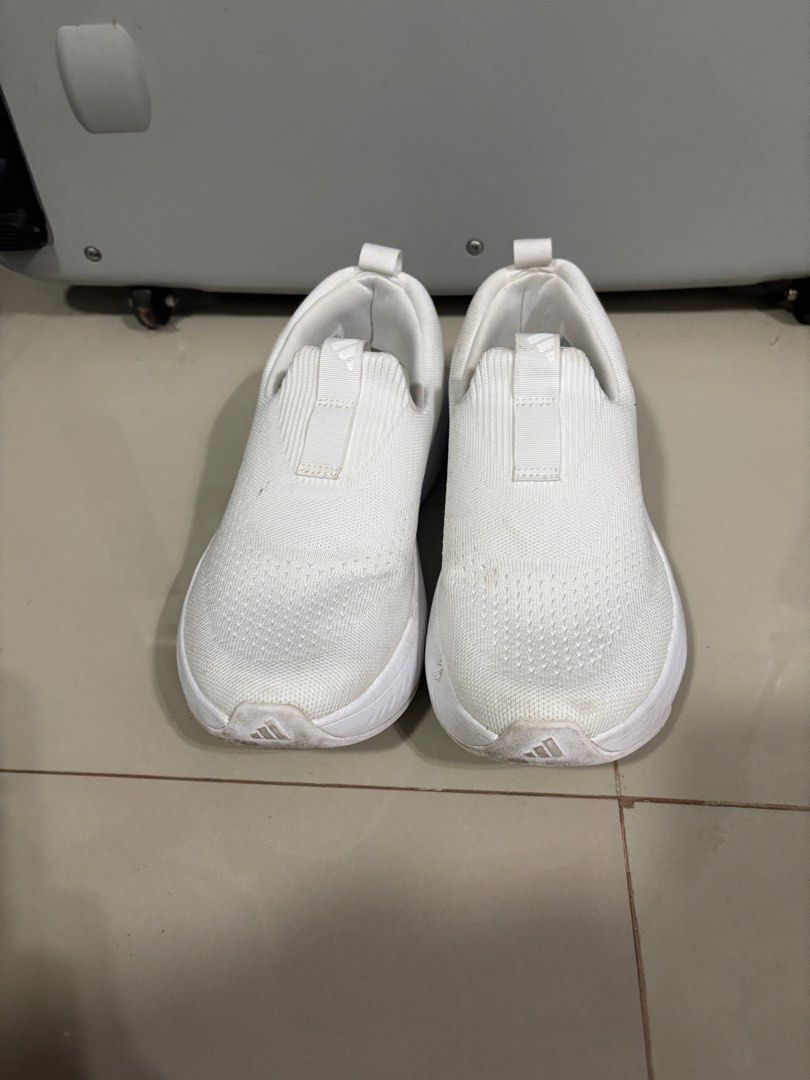 Authentic Adidas Cloudfoam Walk Slip-On Sneakers White (Category: Sneakers) located in Paranaque City. Submitted by emjayselltheirstuff (Listing ID 1461877960, Image 3). Description: - White Adidas slip-on sneakers -Size: US 6.5/UK 4.5 - Features Cloudfoam Comfort sole for excellent cushioning - Effortless slip-on design for easy wear - Perfect for everyday activities and casual outings.