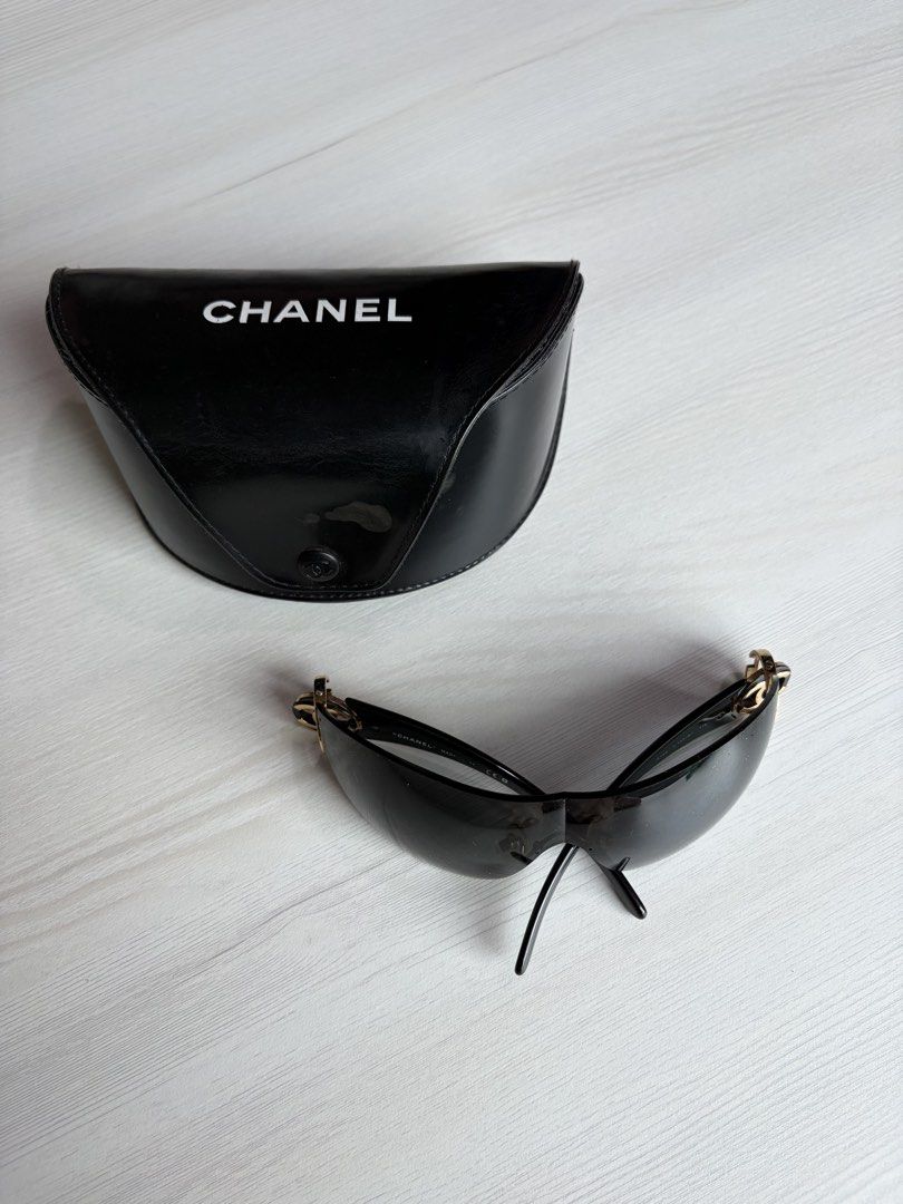 Authentic Chanel Black Sunglasses (Category: Luxury Accessories) located in Manila. Submitted by declutter_diariess (Listing ID 1462007780, Image 2). Description: Authentic, money back guarantee Gold hardware Very pretty Take note than this is vintage preloved. There are some scratches already on lens.