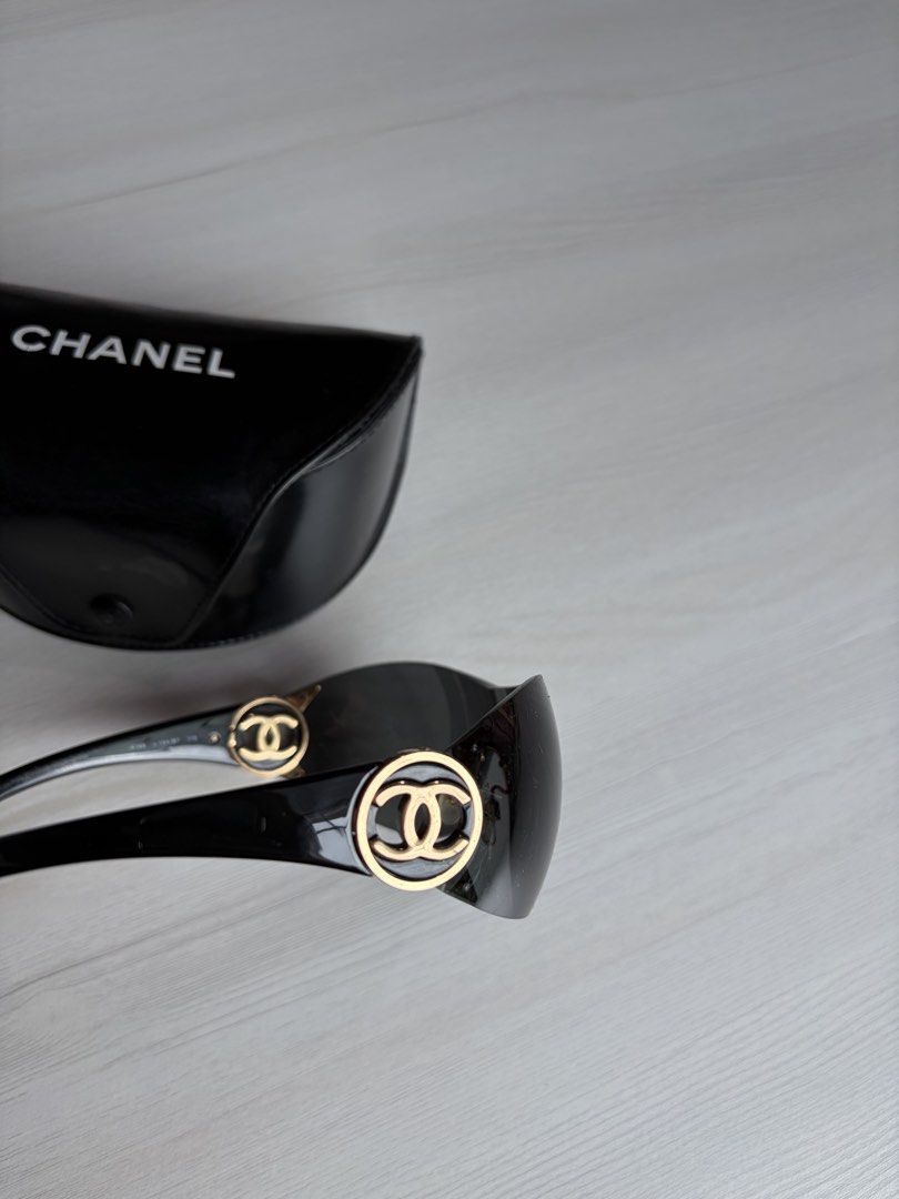 Authentic Chanel Black Sunglasses (Category: Luxury Accessories) located in Manila. Submitted by declutter_diariess (Listing ID 1462007780, Image 1). Description: Authentic, money back guarantee Gold hardware Very pretty Take note than this is vintage preloved. There are some scratches already on lens.