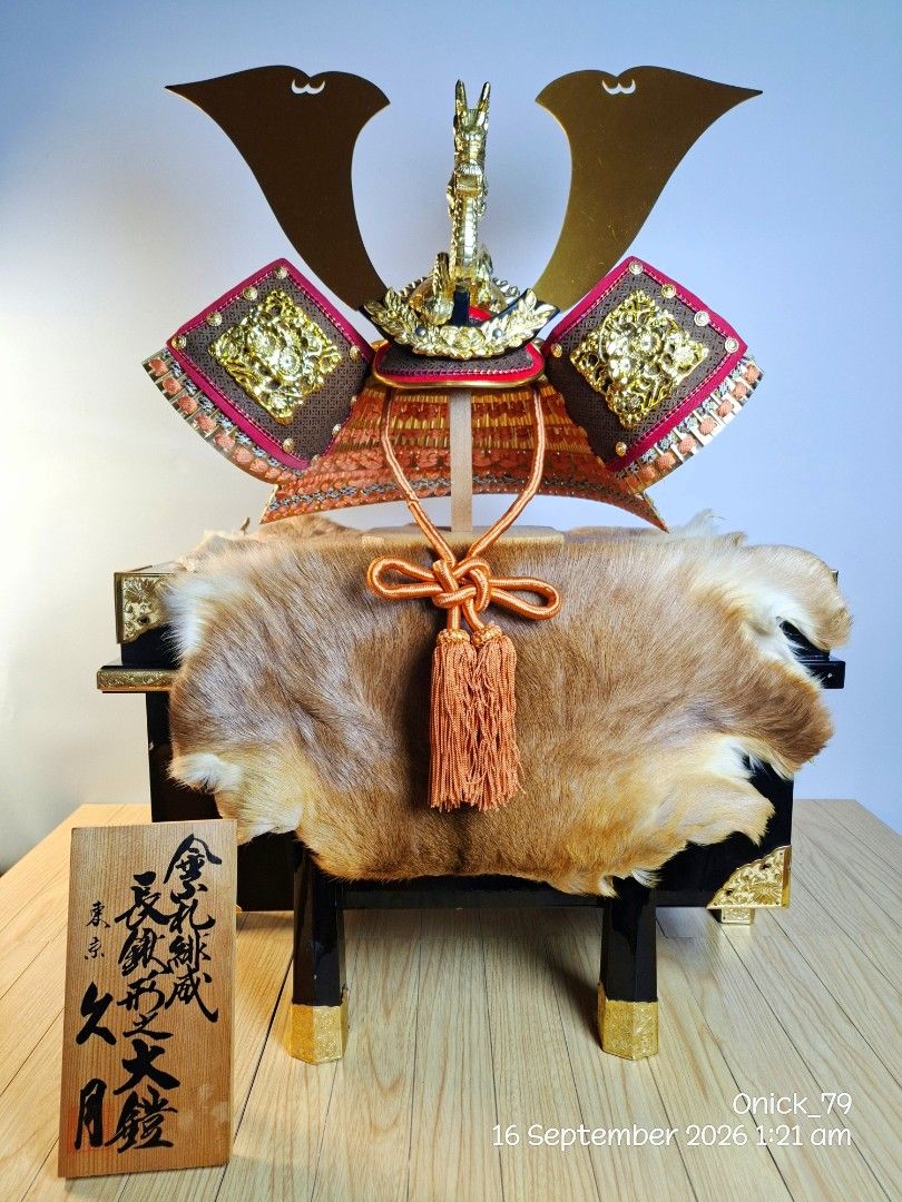 Authentic Japanese Kabuto Samurai Helmet (Museum-Quality Display) (Category: Other Home Decor) located in Pasay City. Submitted by onick_79 (Listing ID 1461995801, Image 1). Description: Highly detailed Japanese Samurai Kabuto display. Featuring an intricate golden dragon crest (maedate), traditional woven lacing, ornate brass hardware, and authentic fur trim, this centerpiece looks straight out of a museum gallery. Perfect for collectors, Japane