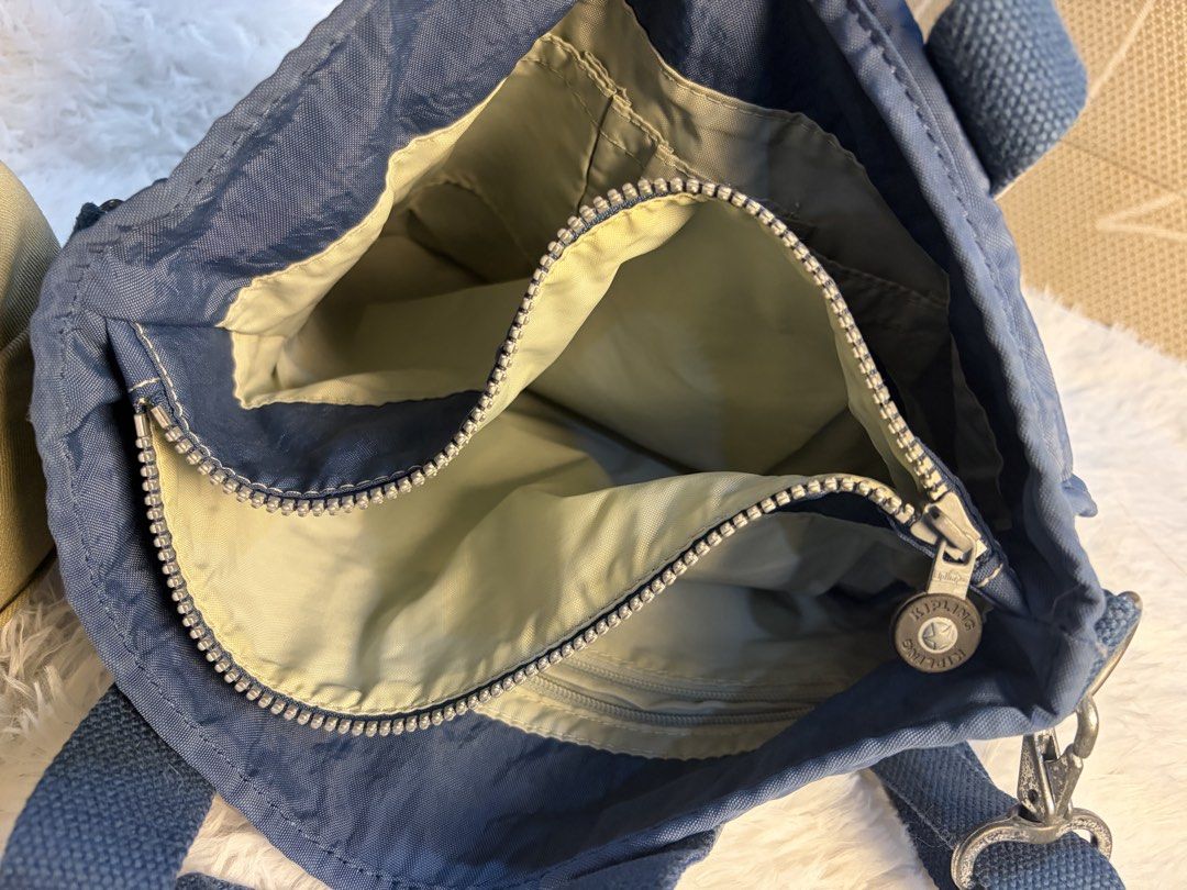 Authentic Kipling sling bag (Category: Cross-body Bags) located in Goa. Submitted by zahar_modern_thrift_bags001 (Listing ID 1461988643, Image 2). Description: No key chain PreLoved.