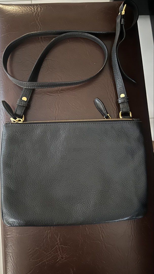 Authentic Prada Leather Double Zip Sling Bag (Category: Luxury Bags & Wallets) located in Las Pinas. Submitted by marshmallowmax (Listing ID 1461832784, Image 3). Description: Excellent used! No flaws With dustbag.